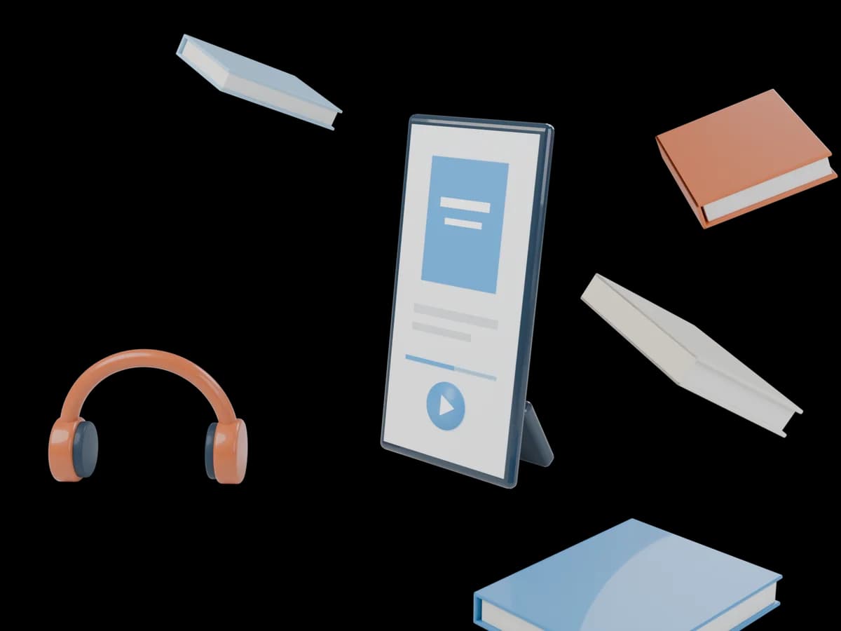 A phone playing a book summary, with headphones and books floating around it