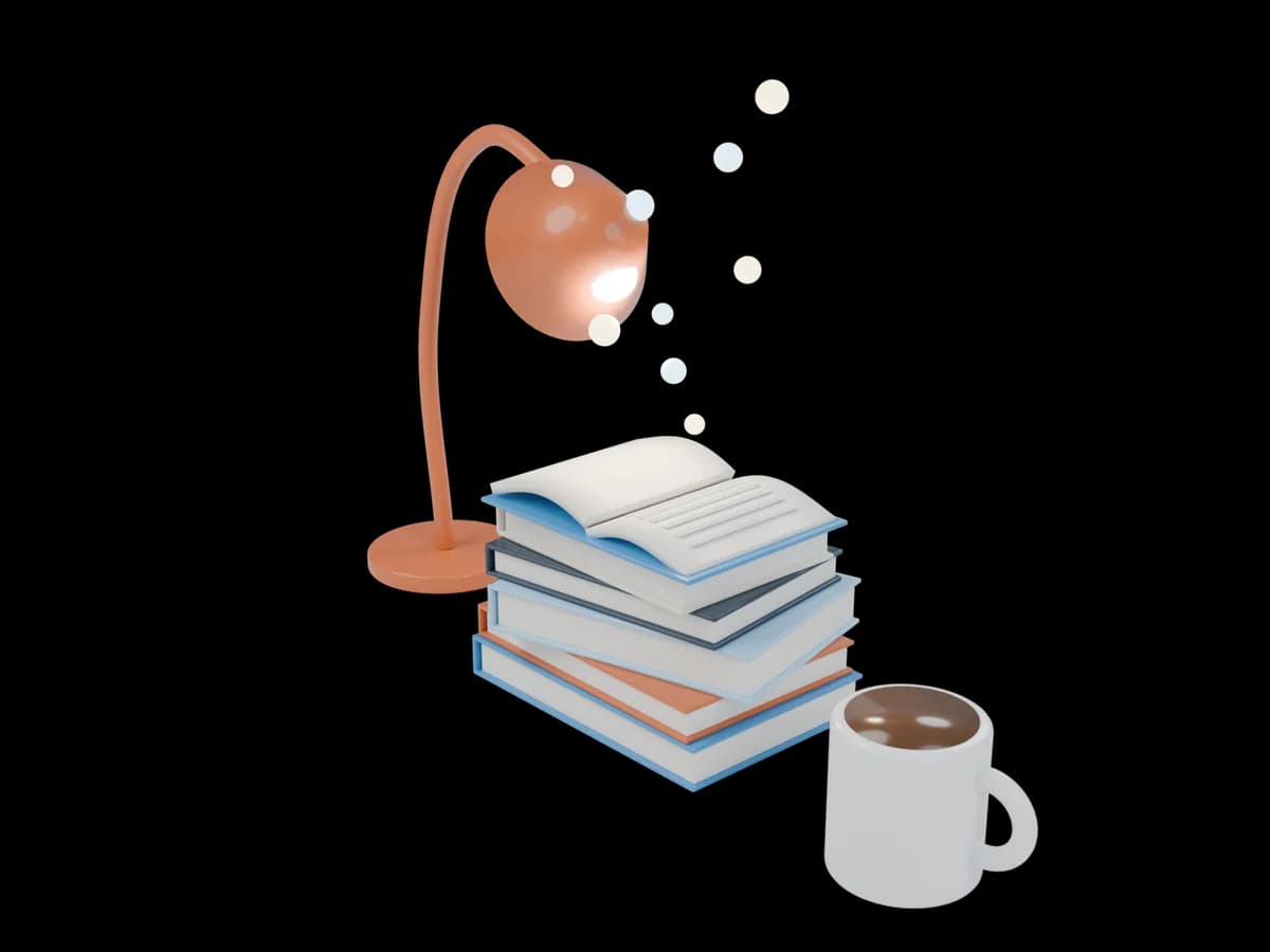 A stack of books and an open book under a reading lamp, with a cup of coffee